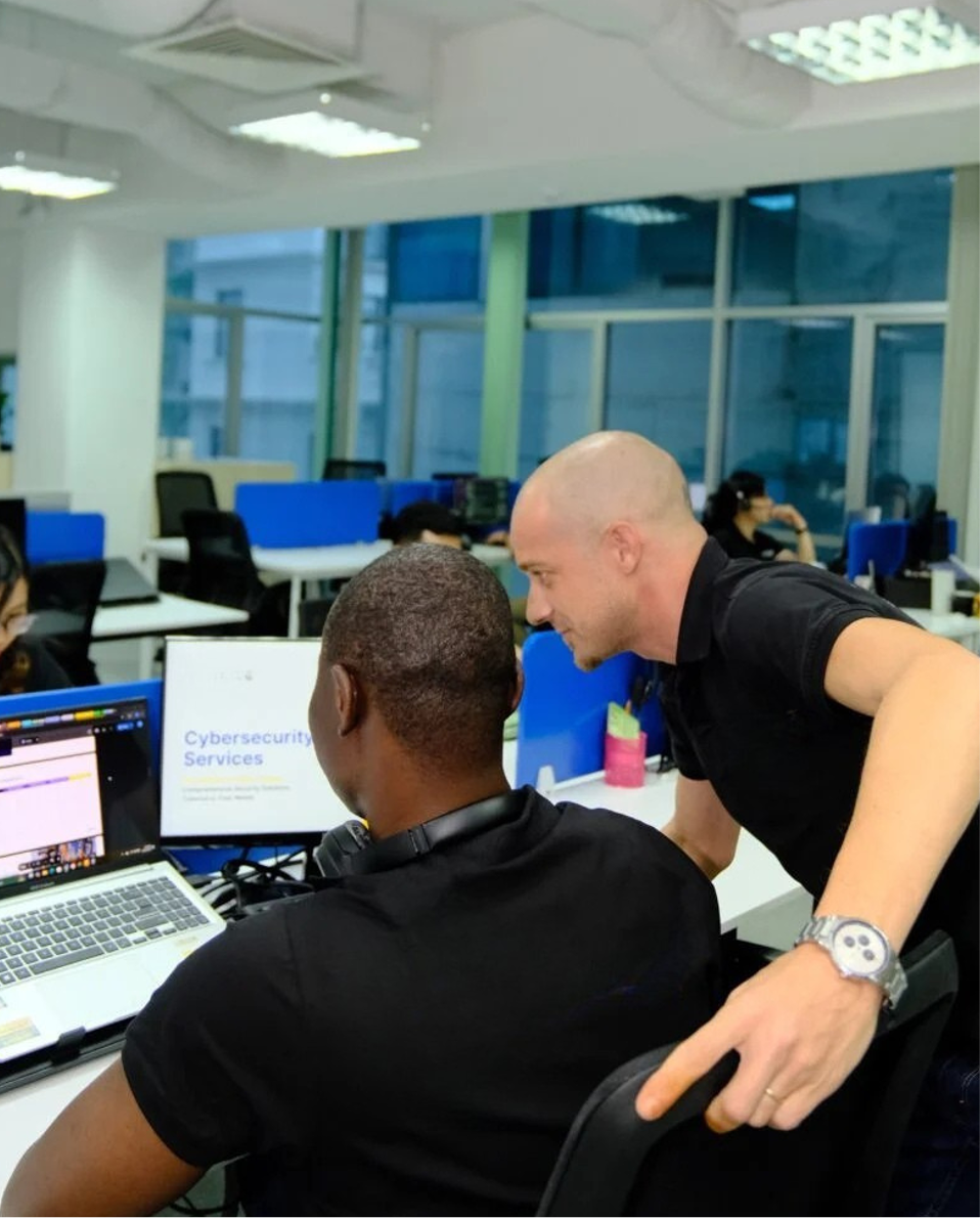 Elusyn team collaborating in modern office environment